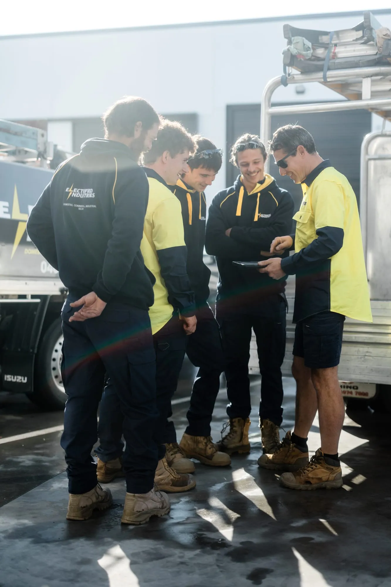 The Electrified Industries crew on the job in Newcastle