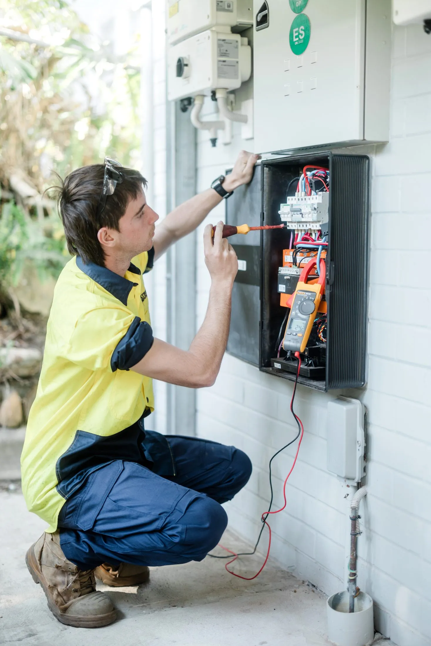 Electrified Industries electrician working on a domestic switchboard
